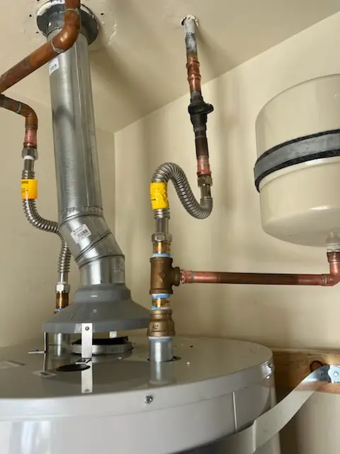 Water heater installation and plumbing repair in Hooper